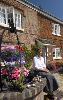 Anne outside Bridge Farm